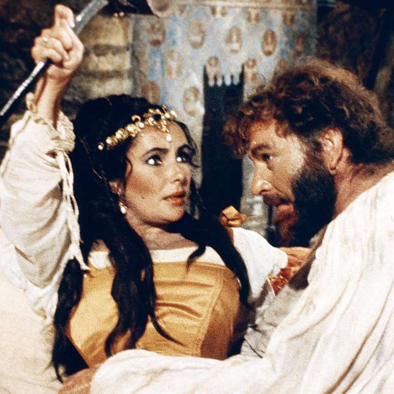 Elizabeth Taylor (1932-2011) e Richard Burton (1925-1984) viveram Catarina e Petruchio no filme 'A Megera Domada' (1967). No Brasil, a pe&ccedil;a de Shakespeare serviu de base para tr&ecirc;s telenovelas, incluindo 'O Cravo e a Rosa' (2000-2001), da TV Globo.