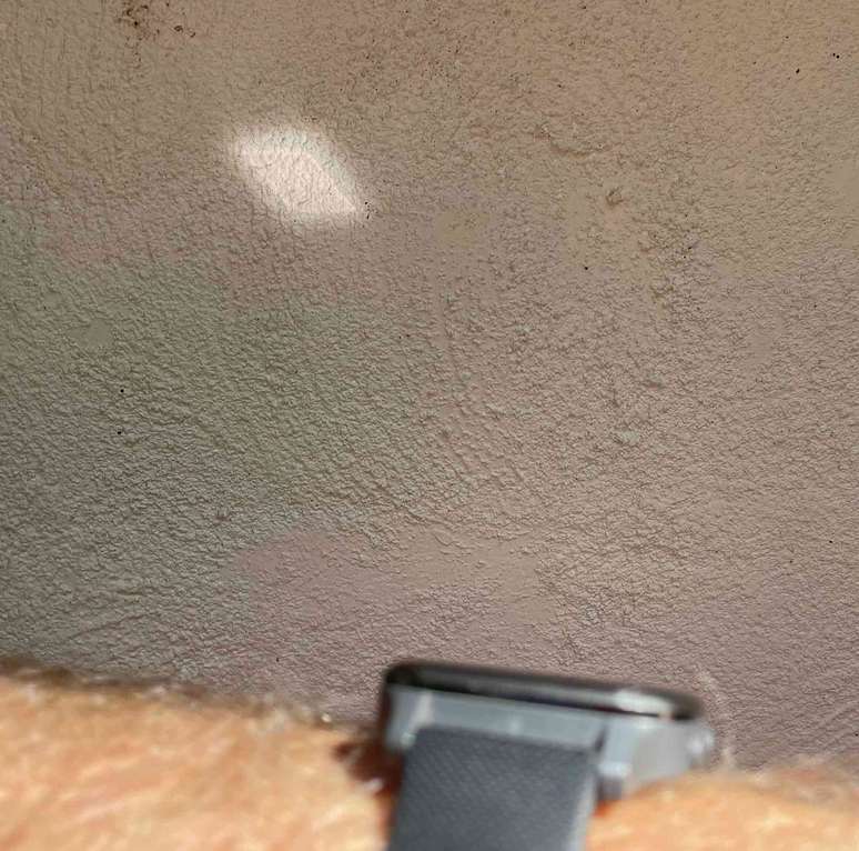 Sunlight reflected on a clock. Sunlight reflected on a clock.