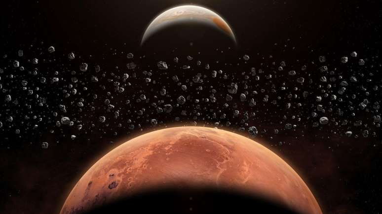 J&aacute; foram encontradas quase-luas em torno de J&uacute;piter, V&ecirc;nus, Saturno, Netuno e Plut&atilde;o (representa&ccedil;&atilde;o art&iacute;stica)