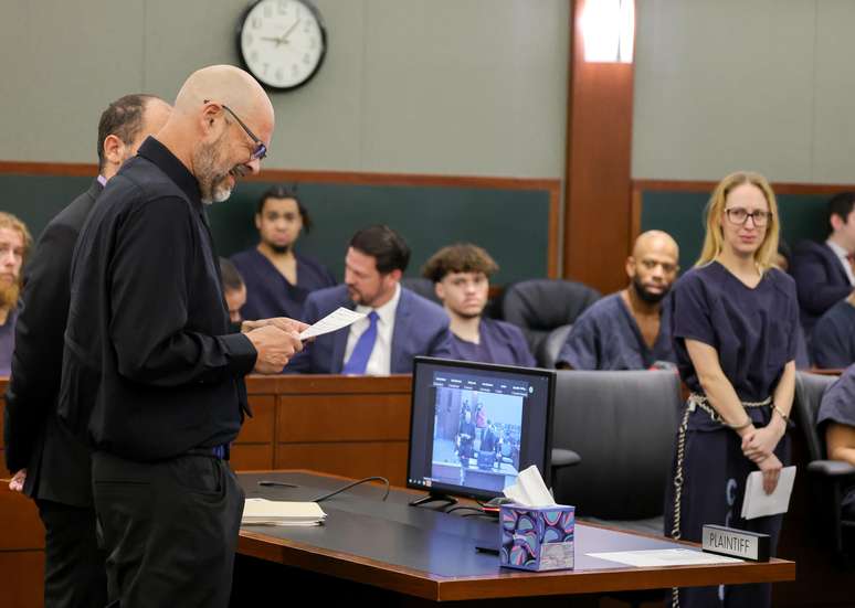 Aaron Goodwin testifies in front of his wife Victoria Aaron Goodwin testifies in front of his wife Victoria