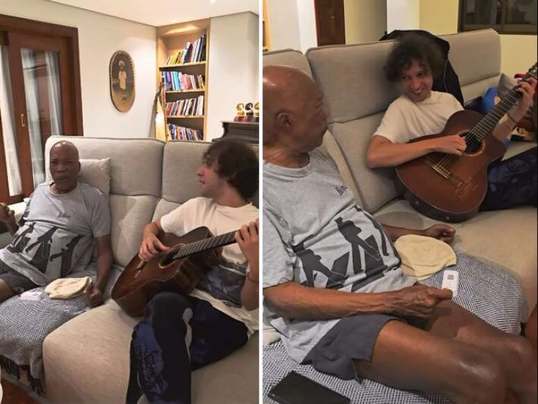 O m&uacute;sico Pedro Martins mostra v&iacute;deo ao lado de Milton Nascimento