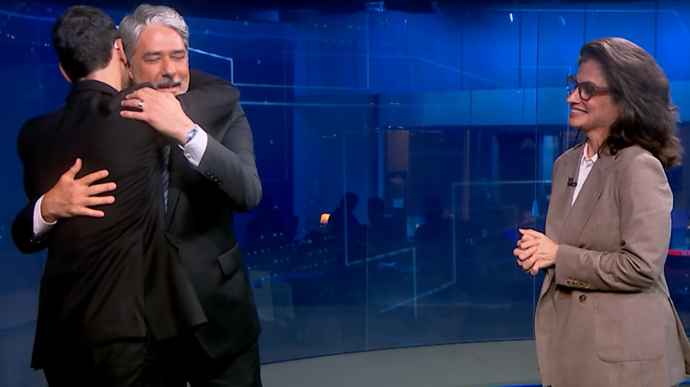 William Bonner e Renata Vasconcellos recebem C&eacute;sar Tralli no JN