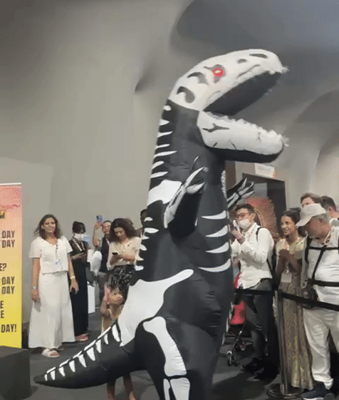 With humor, sarcasm and inflatable dinosaurs, organizers 'honoured' Japan on this fourth day