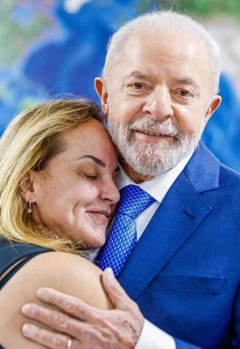 O presidente Luiz Inácio Lula da Silva ao lado da filha Lurian