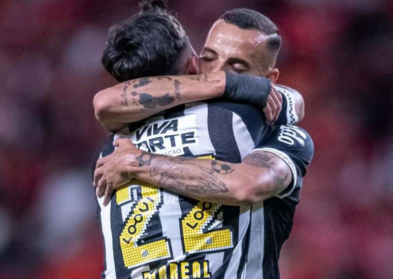 Barreal celebrates his goal with Guilherme, who provided the assist –