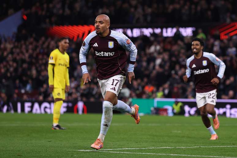 Malen celebrates one of the goals of Aston Villa's win over Young Boys 