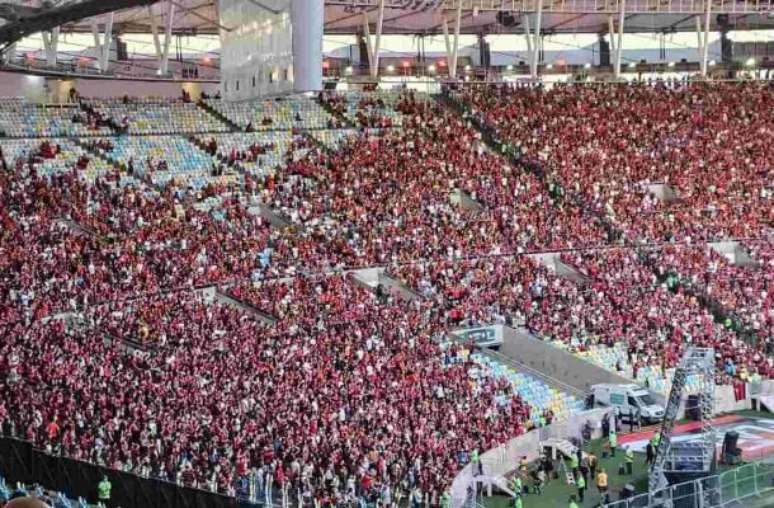 Before the match, street vendors were selling tournament banners throughout the Maracana -