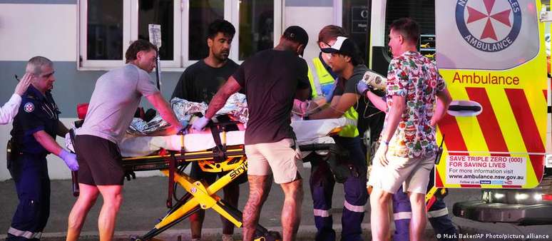 The injured are treated after gunfire on the beach 