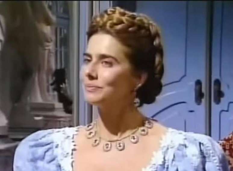 Na novela de 1986, na extinta TV Manchete, a protagonista foi interpretada pela atriz Mait&ecirc; Proen&ccedil;a, que deu rosto e corpo &agrave; figura hist&oacute;rica, refor&ccedil;ando o imagin&aacute;rio de sedu&ccedil;&atilde;o e enfrentamento ao moralismo &ndash; Reprodu&ccedil;&atilde;o/TV Manchete