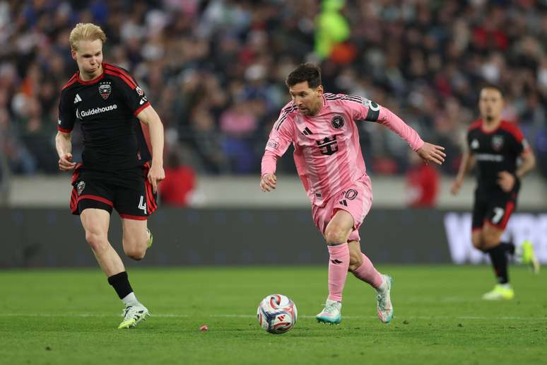 BALTIMORE, MARYLAND &ndash; MARCH 07: Lionel Messi #10 of Inter Miami CF runs with the ball whilst under pressure from Matti Peltola #4 of D.C. United during the MLS match between D.C. United and Inter Miami CF at M&T Bank Stadium on March 07, 2026 in Baltimore, Maryland. (Photo by Patrick Smith/Getty Images)