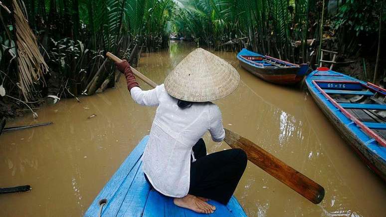 Um passeio de barco pelo Delta do Mekong, no Vietn&atilde;, &eacute; uma das maneiras mais aut&ecirc;nticas de vivenciar a vida local