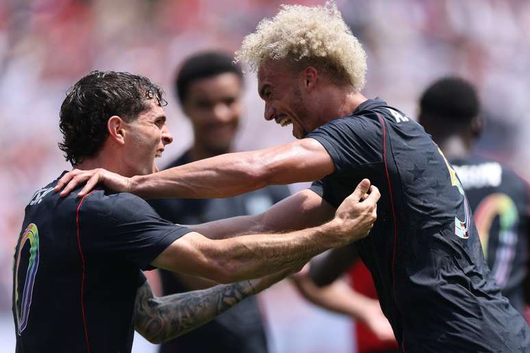 CHICAGO, ILLINOIS &ndash; JUNE 06: Antonee Robinson of United States celebrates with teammate Christian Pulisic after scoring his team&rsquo;s first goal during the international friendly match between United States and Germany at Soldier Field on June 06, 2026 in Chicago, Illinois. (Photo by Jamie Squire/Getty Images)