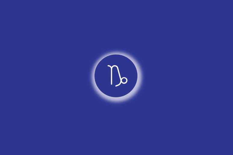 Ilustra&ccedil;&atilde;o do signo de Capric&oacute;rnio em um c&iacute;rculo azul, com luz branca ao redor, sobre um fundo azul