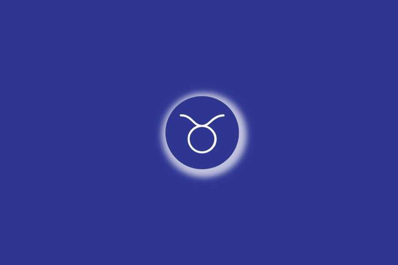 Ilustra&ccedil;&atilde;o do signo de touro em um c&iacute;rculo azul, com luz branca ao redor, sobre um fundo azul