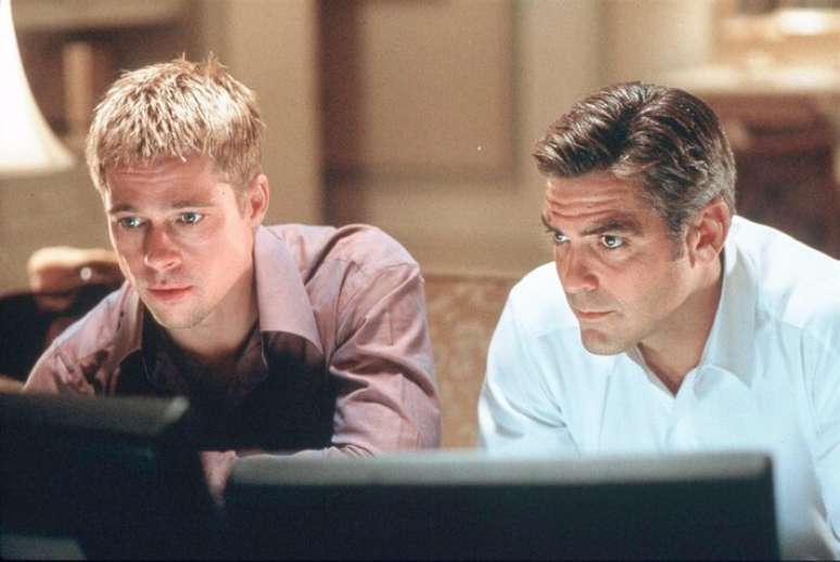 Brad Pitt e George Clooney em cena de 'Onze Homens e um Segredo'