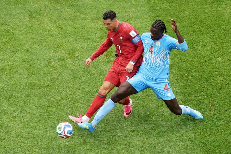 HOUSTON, TEXAS &ndash; JUNE 17: Cristiano Ronaldo #7 of Portugal is challenged by Axel Tuanzebe #4 of Congo DR during the FIFA World Cup 2026 Group K match between Portugal and Congo DR at Houston Stadium on June 17, 2026 in Houston, Texas. (Photo by Lars Baron/Getty Images)