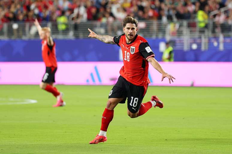 Schmid vibra intensamente ap&oacute;s fazer o primeiro&nbsp; gol da &Aacute;ustria .