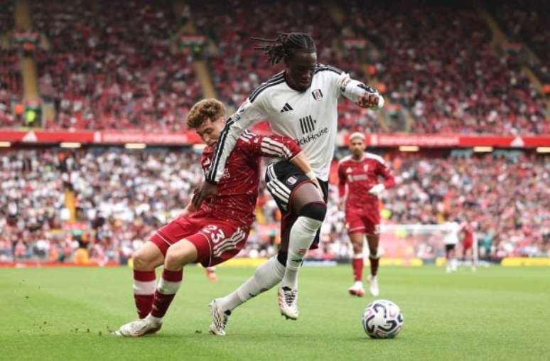 Ian MacNicol/Getty Images - Legenda: Liverpool fica no empate com o Fulham