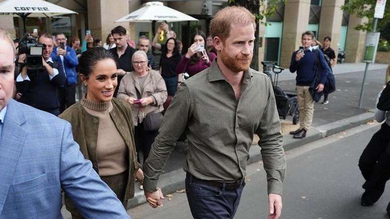 Harry e Meghan fotografados durante uma visita a Melbourne, Austr&aacute;lia, em abril