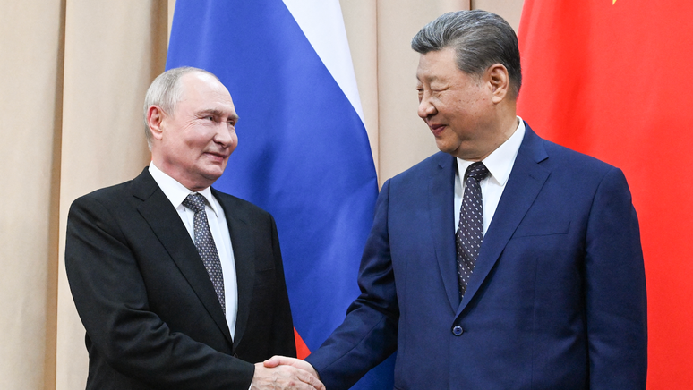 Xi Jinping descreveu o presidente da R&uacute;ssia, Vladimir Putin, como seu 'confidente mais pr&oacute;ximo'