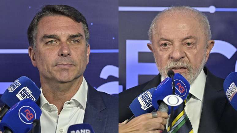 Fl&aacute;vio Bolsonaro e Lula na chegada para o debate na Band