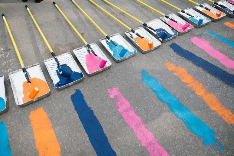 A cerim&ocirc;nia da pintura da blue line na linha de chegada da Maratona de Nova York (Foto: Da Ping Luo / NYRR)
