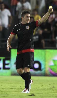 Cristian Rodriguez, of Atlteico Madrid, celebrates after scoring the 1-0 during a group match in the Europa League against Hapoel Tel-Aviv.