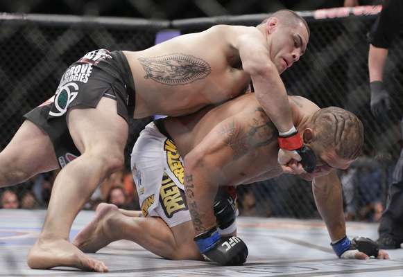 Cain Velásquez derrotou o brasileiro Antonio "Pezão" e manteve o cinturão dos pesados; confira as melhores fotos do UFC 160