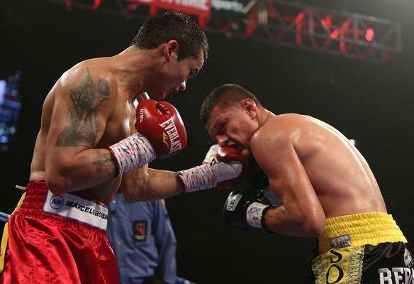 El Chino Maidana noquéo en el sexto asalto a Josesito López y retuvo su título Intercontinental Welter de la AMB,