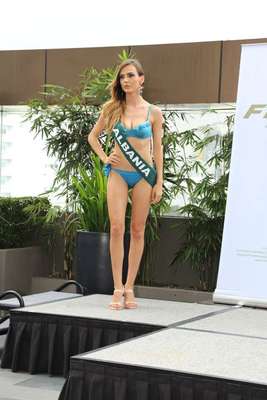 Miss Albania - Afroviti Goge, tiene 23 años de edad, mide 1.77 metros de estura (5 ft 9 12 in)y reside en Tirana.