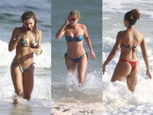 Grazi Massafera, Christine Fernandes e Sheron Menezes não perdem a oportunidade de tomar banho de mar para aplacar o calorão