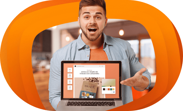 Terra Meu Negócio: seu parceiro em soluções digitais homem de barba com um notebook nas mãos mostrando o terra construtor de sites