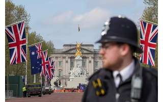 A police officer patrols ahead of the coronation of King Charles in London, May 3, 2023 REUTERS/Maja Smiejkowska