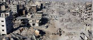 Palestinos retornam à Cidade de Gaza e encontram ambiente devastado pelo conflito