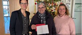 Membros do serviço social feminino da Diocese de Rottenburg-Stuttgart com o bilhete de "Andorinha"; Svenja Gruß está à esquerda
