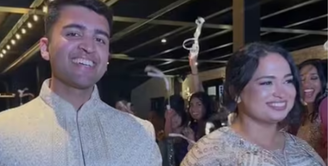 Dave Fiji ao lado da esposa Jesni durante seu casamento