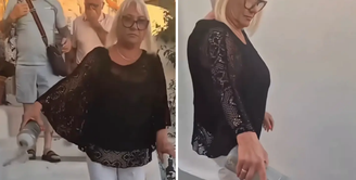 Mulher espalha cinzas do marido nas ruas de Santorini, na Grécia