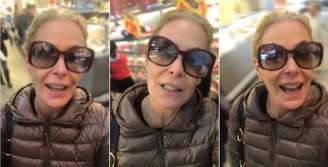 A atriz encheu as sacolas num mercado frequentado por populares