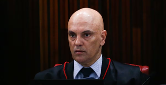 O ministro Alexandre de Moraes disse que sua decisão não proibia contato entre advogados