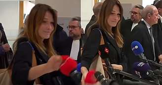 Sorridente, Carla Bruni pegou e jogou no chão a espuma do microfone da Mediapart