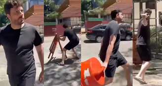 O apresentador do SBT jogou longe a placa e o cone que interditavam a entrada da rua onde mora