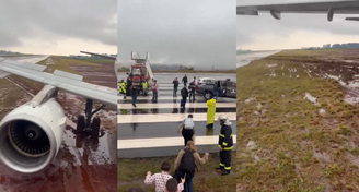 Avião parou em área de grama ao lado da pista de pouso