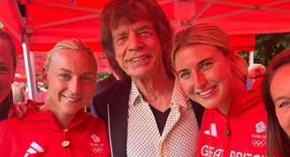 Mick Jagger ao lado de parte da delegação do Reino Unido