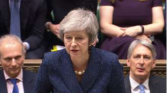 Premiê britânica, Theresa May, durante pronunciamento no Parlamento 12/12/2018 TV do Parlamento/Divulgação via Reuters