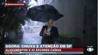 Datena passa perrengue ao gravar na chuva