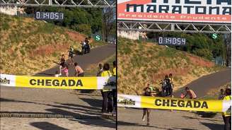 Atleta corria para a linha de chegada quando filhas se aproximaram dela