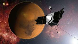 <p>Em ilustração fornecida pela NASA, a sonda Maven se aproxima de Marte em uma missão para estudar a atmosfera do planeta vermelho</p>