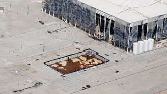 Imagem atual do Estádio de Esportes Aquáticos simboliza o abandono do Parque Olímpico: piscina imundo e estrutura da arena caindo no chão
