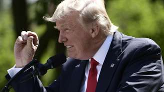 Donald Trump announces his decision to withdraw the US from the Paris Climate Accords in the Rose Garden of the White House on June 1, 2017