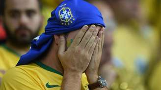 Torcedor brasileiro desolado na partida Brasil x Alemanha, na Copa de 2014, o fatídico 7 a 1
